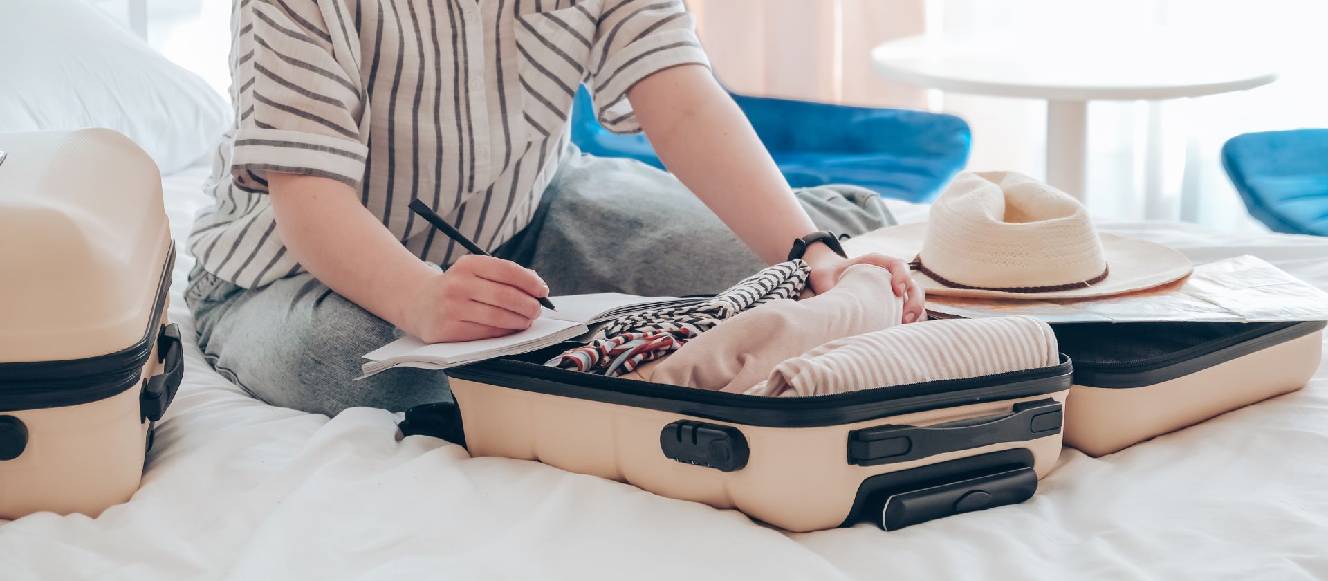 packing clothes in a suitcase
