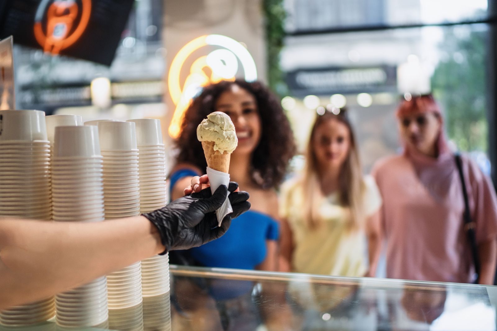 young woman getting ice cream at AMI ice cream shop